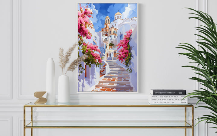 Ibiza Old Town watercolor wall art showing a whitewashed street with pink flowers above a console.
