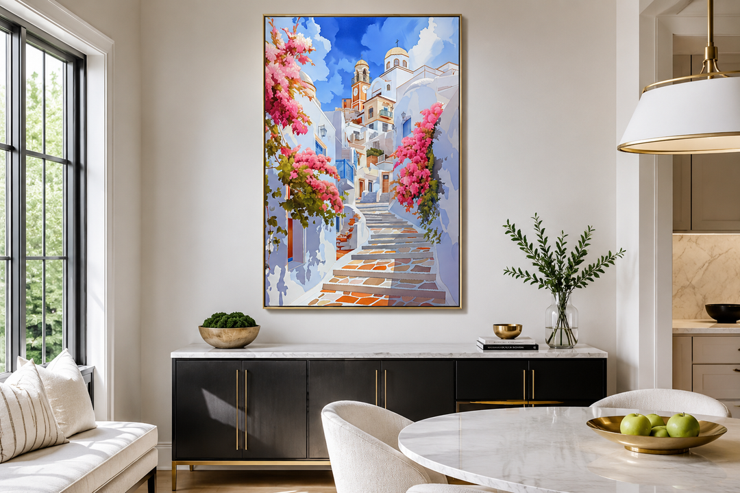 Ibiza Old Town watercolor wall art showing a whitewashed street with pink flowers in a dining room.