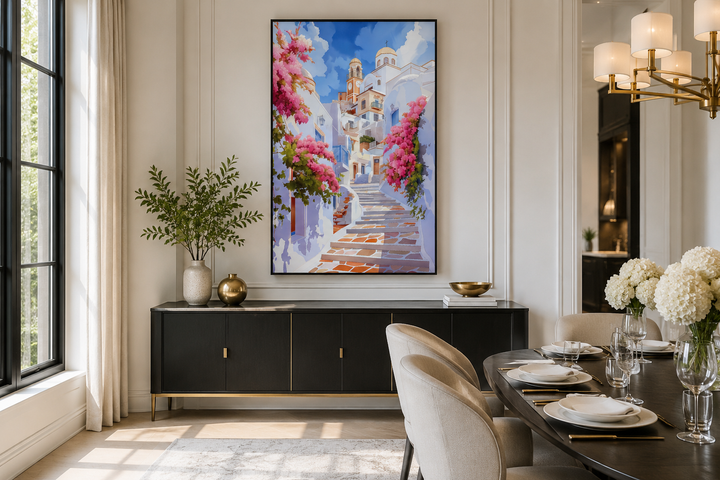 Ibiza Old Town watercolor wall art featuring a whitewashed street with pink flowers over a buffet.