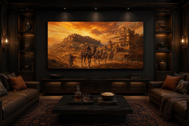 Indian camel caravan painting of a desert landscape with a fortress at sunset on a large screen.