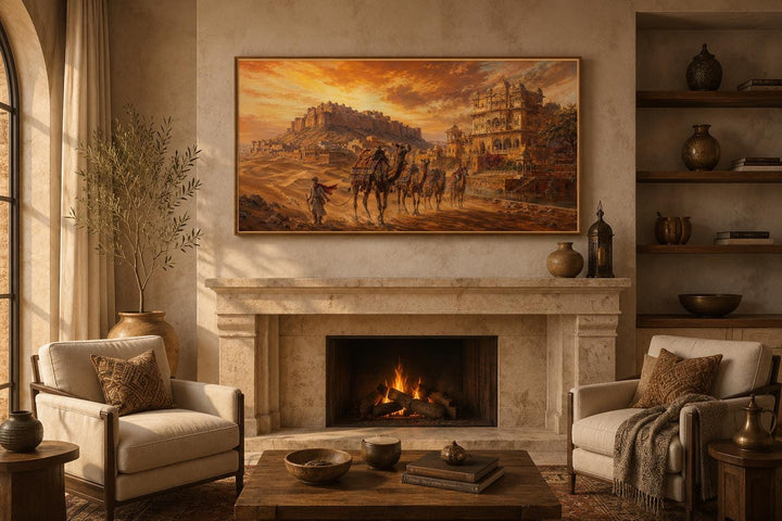 Indian camel caravan painting above a fireplace in a warm, rustic living room.