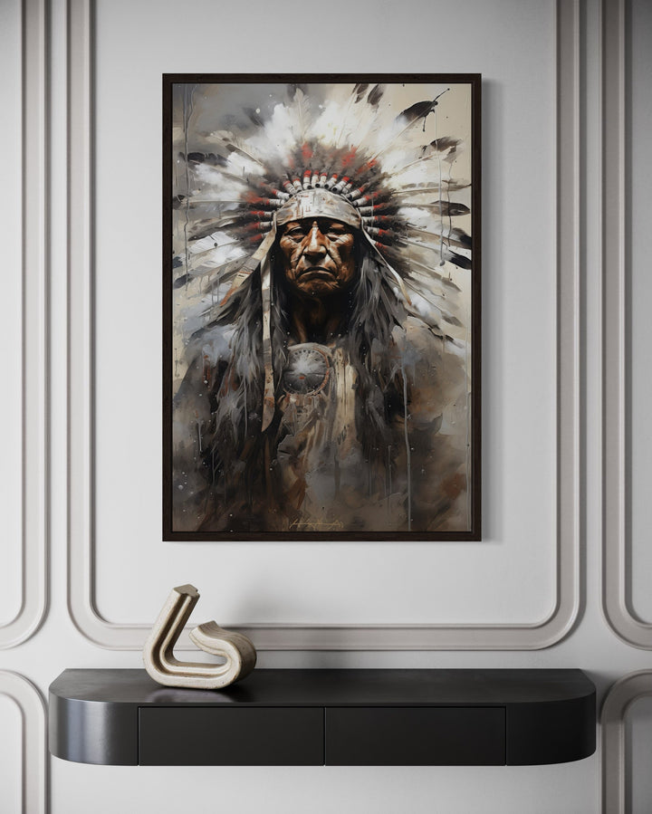 Indian Chief Native American framed canvas wall art hanging above a black console table.