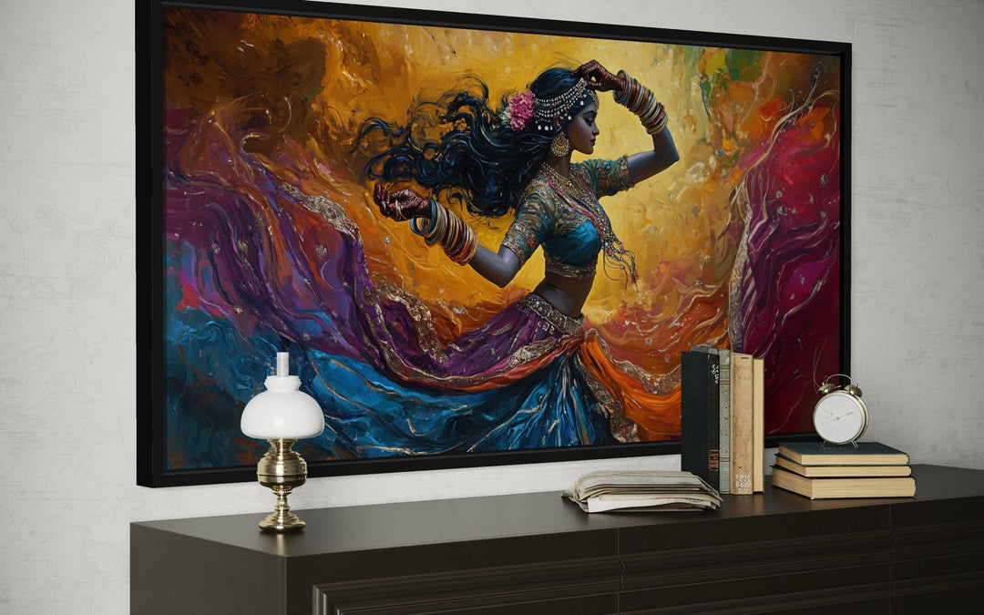 Vibrant canvas print of a Bollywood dancer in motion with swirling colors and textured brushwork.