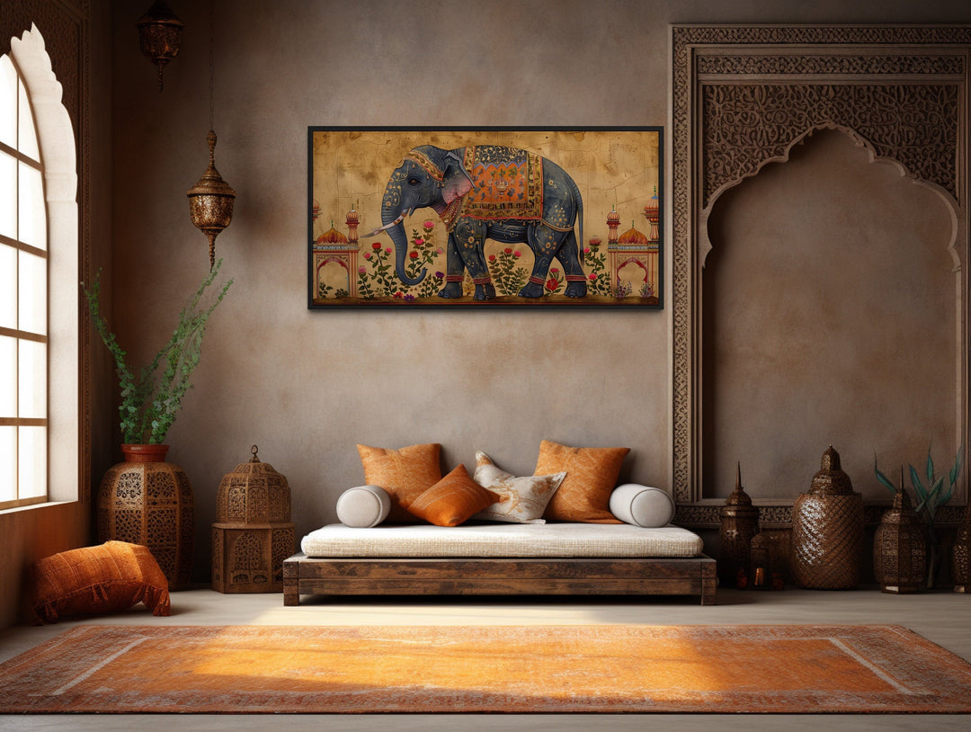 Traditional framed canvas wall art featuring an intricately adorned Indian elephant on a gold base.
