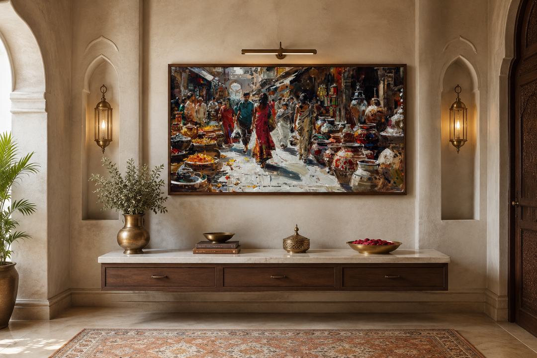 Framed canvas painting of a vibrant Indian street bazaar above a wooden floating console.