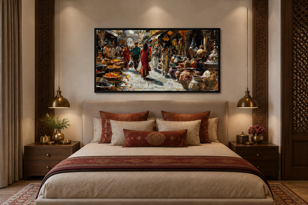 Framed canvas painting of a vibrant Indian market scene hanging above a bed in a bedroom.