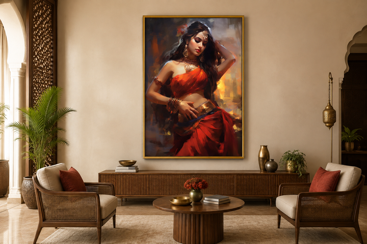Framed canvas wall art of an Indian woman in a red sari dancing, displayed in a modern living room.