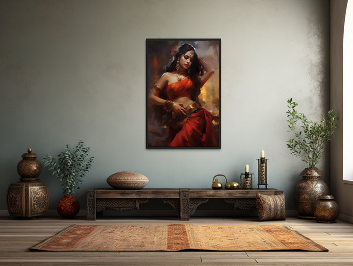 Indian woman dancing traditional folk dance framed canvas wall art in a bohemian living room.