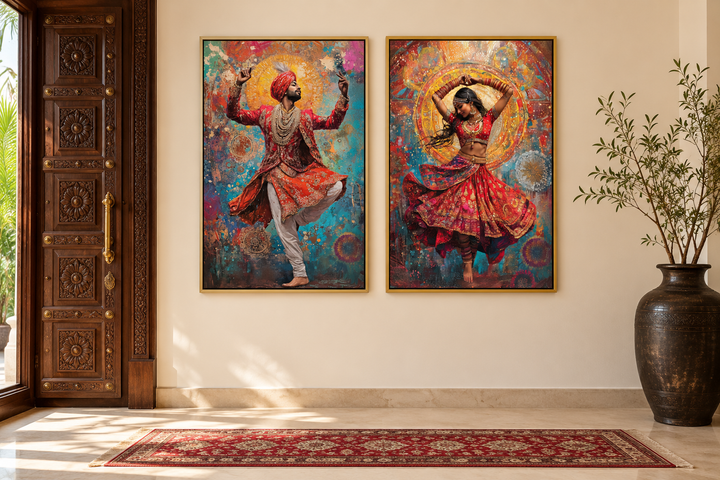 Two vertical framed canvas prints of a man and woman in traditional Indian dance poses.