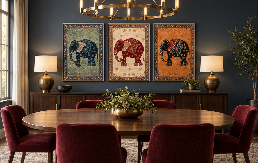 Set of 3 Indian Madhubani elephant canvas prints in green, cream, and orange on a dark blue wall.