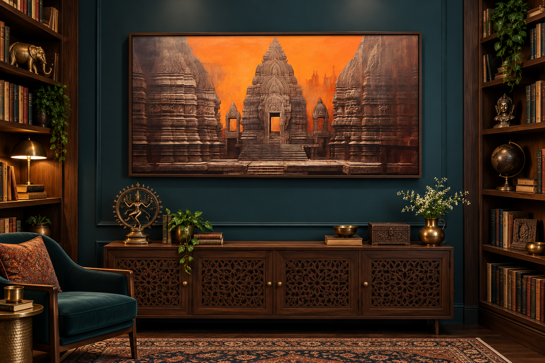 Framed orange and brown canvas print of an ancient Indian temple on a dark teal wall.