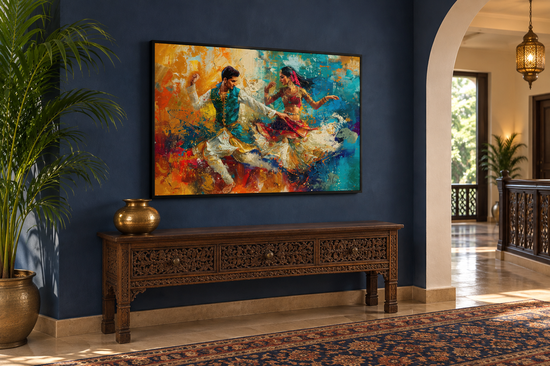 Vibrant framed canvas wall art of a man and woman performing a traditional Bollywood dance.