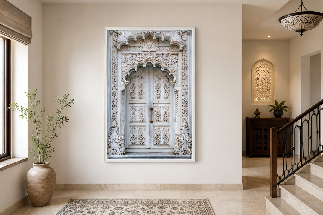 White and grey framed canvas wall art of an intricately carved traditional Indian door.