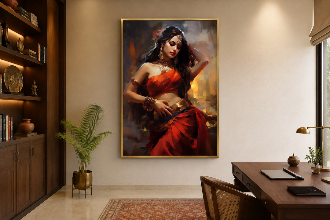 Framed canvas wall art of an Indian woman in a red sari dancing, displayed in a modern office.