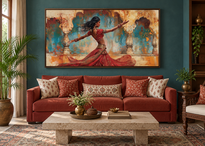 Framed canvas print of a traditional Indian woman dancer in a red dress on a teal living room wall.