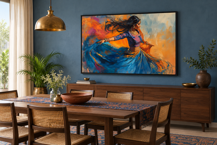 Vibrant framed canvas art of an Indian woman dancing, hung in a modern blue dining room.