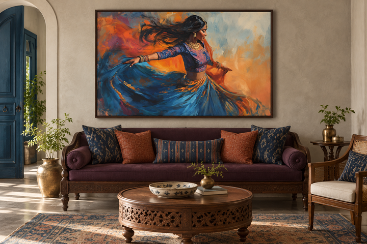 Indian woman dancing framed canvas wall art above a purple sofa in a cultural living room.