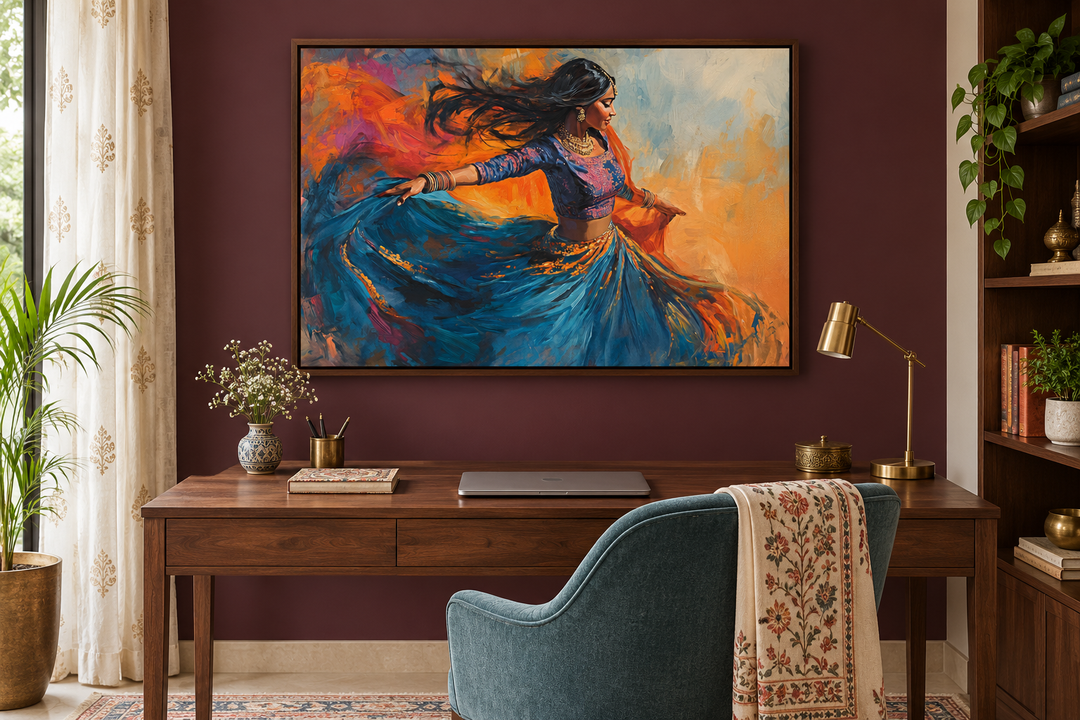 Framed canvas wall art of an Indian woman dancing in a blue dress against a vibrant orange backdrop.