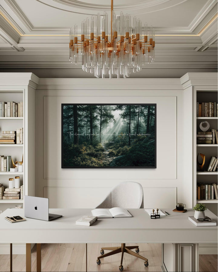 Inspirational John Muir quote canvas wall art featuring a misty forest scene in a home office.