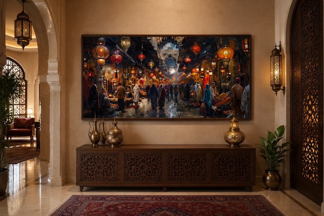 Framed canvas painting of a bustling oriental bazaar market scene hanging above a wooden console.