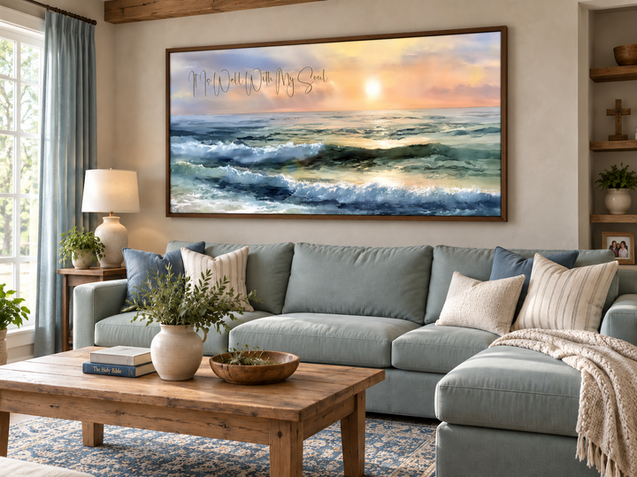 It Is Well With My Soul wall art featuring a peaceful ocean seascape at sunset over a blue sofa.