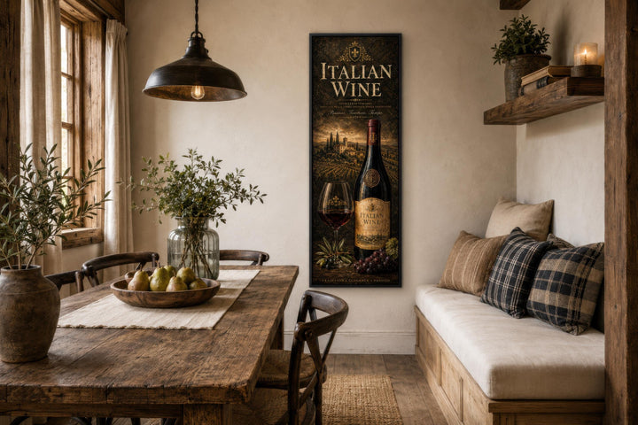 A vertical canvas print of Italian wine art hangs in a rustic dining room with a wooden table.