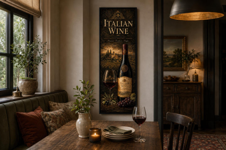 A vertical canvas print of Italian wine art hangs in a rustic dining room with a vineyard scene.