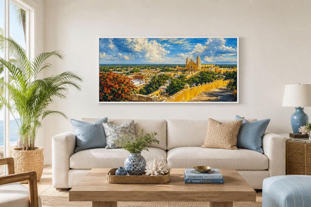 Izamal Cityscape canvas wall art featuring yellow colonial buildings above a white sofa.