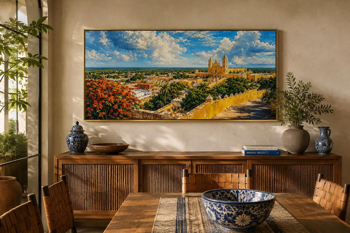 Izamal Cityscape canvas wall art featuring yellow colonial buildings above a wooden console table.