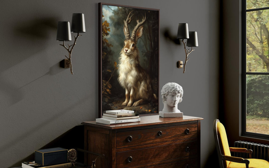 Framed canvas wall art of a majestic jackalope in a dark, moody forest setting.