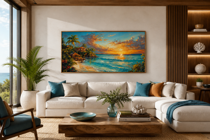 Jamaican sunset beach framed canvas wall art above a white sofa in a modern coastal living room.