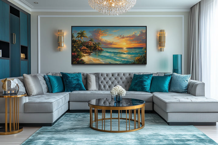 Jamaican Sunset Beach Framed Canvas Wall Art hanging above a grey sectional sofa in a living room.