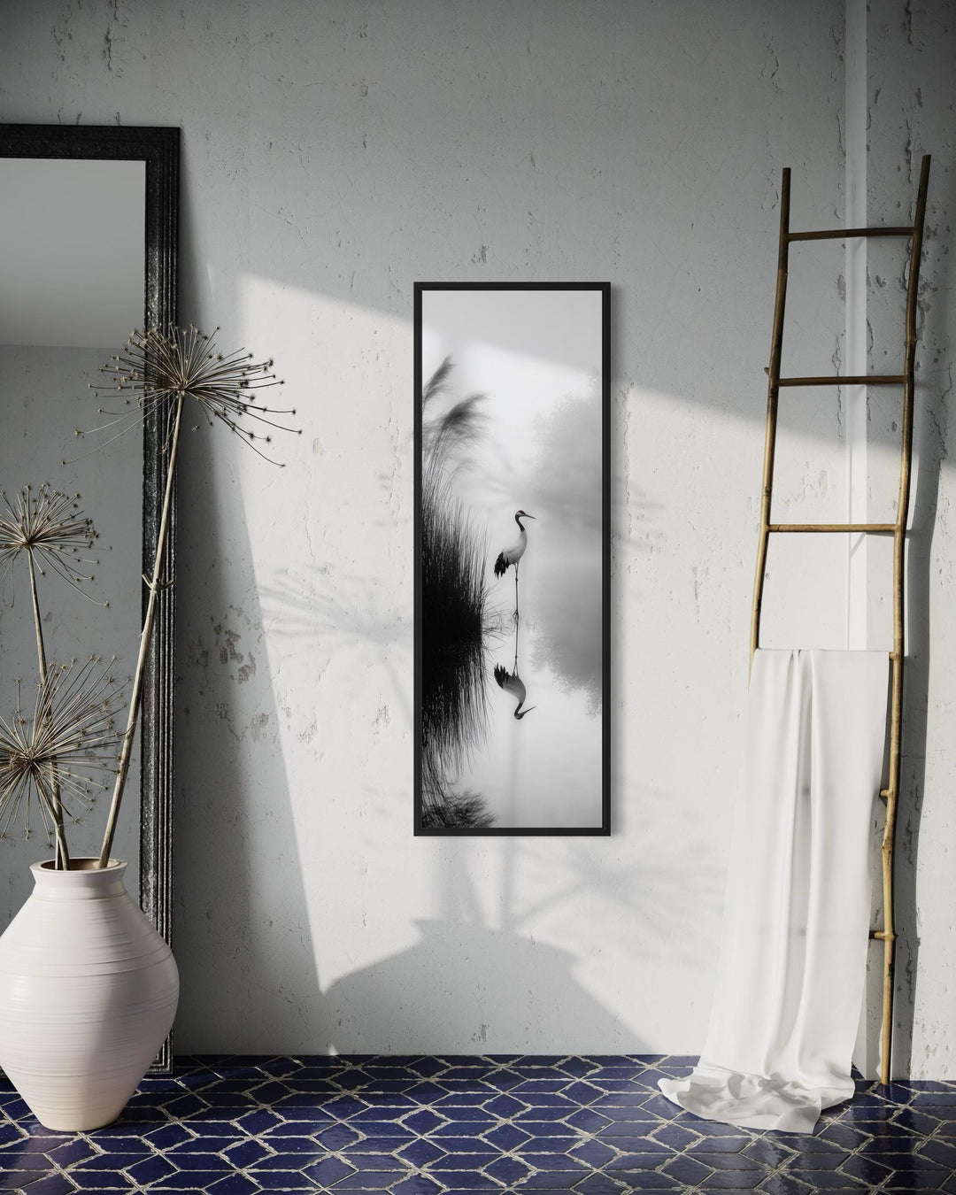 Vertical narrow black and white canvas print of a Japanese crane reflected in a serene lake.