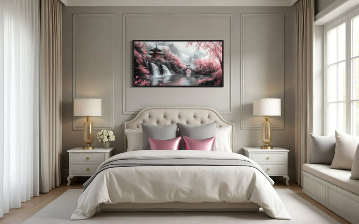 Framed canvas art of a Japanese pagoda with pink cherry blossom trees.