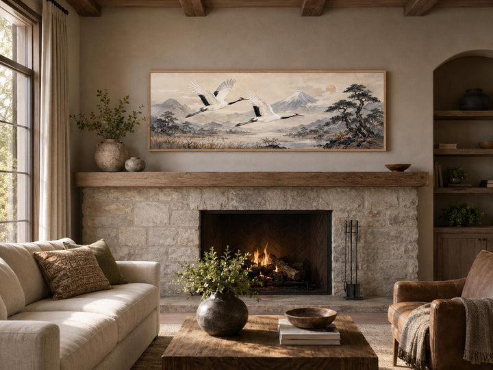 Japanese watercolor canvas of red-crowned cranes over misty mountains in a zen living room.