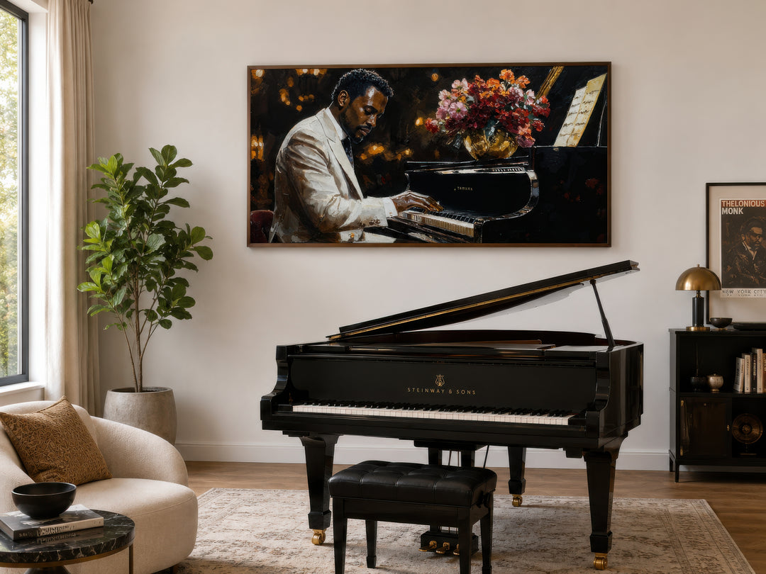 Framed canvas wall art of an African American man playing a piano, hung above a black grand piano.