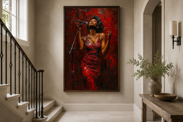 Framed canvas art of an African American woman jazz singer in a red dress on a neutral hallway wall.