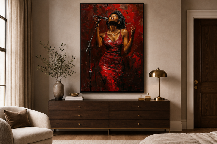 Framed canvas wall art of an African American woman jazz singer in a red dress over a dark dresser.