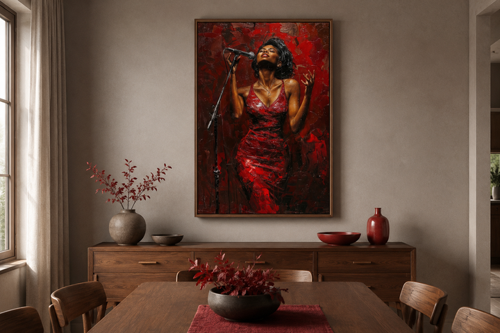 Framed canvas art of an African American woman jazz singer in a red dress above a wooden sideboard.