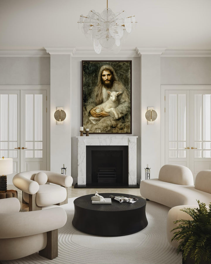 Framed vertical canvas of Jesus holding a lamb centered above a fireplace in a modern living room.