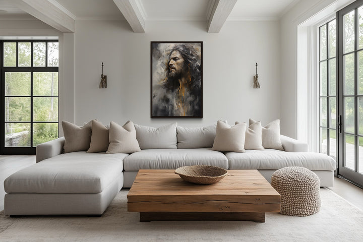 Jesus Christ abstract modern Christian framed canvas wall art hanging above a sofa in a living room.