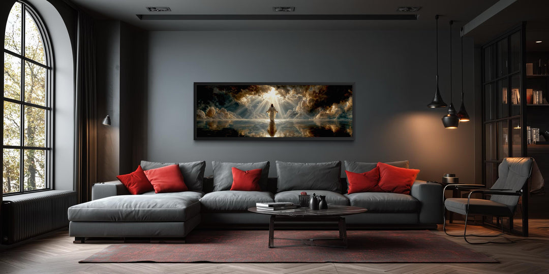 Panoramic canvas print of Jesus walking on water displayed in a modern, dark-toned living room.