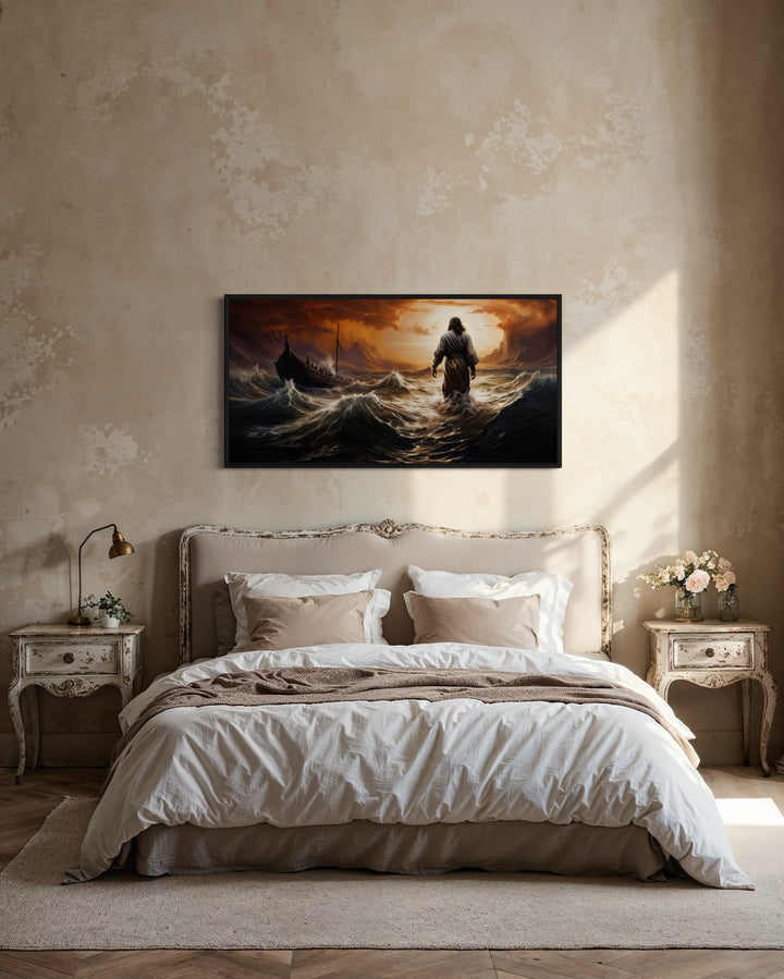 Framed canvas wall art of Jesus walking on water in a storm above a bed in a rustic bedroom.