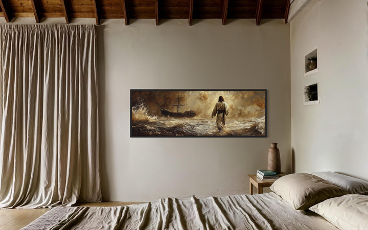 Jesus Walking On Water Long Horizontal Framed Canvas Wall Art above a bed in a neutral bedroom.