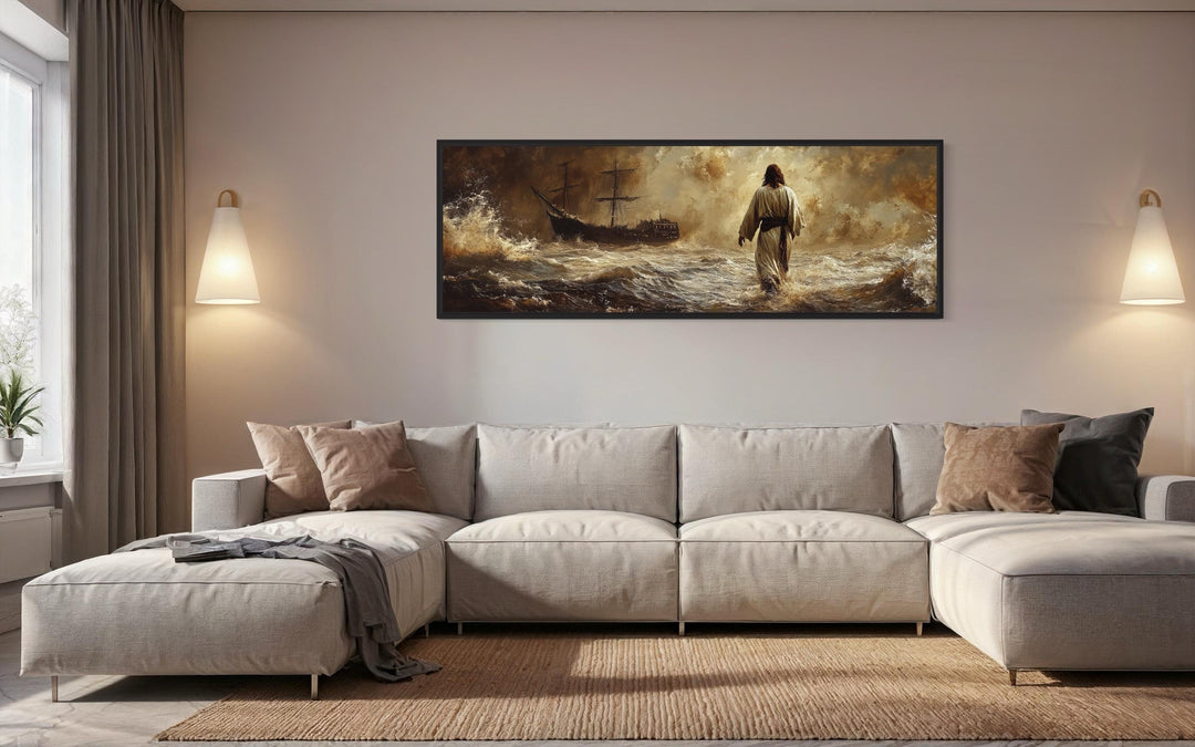 Jesus Walking On Water Long Horizontal Framed Canvas Wall Art above a modern sofa in a living room.