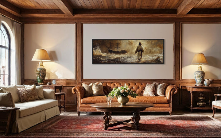 Jesus Walking On Water long horizontal framed canvas wall art above a leather sofa in a living room.