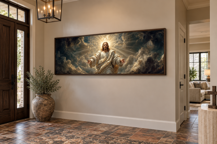 Panoramic canvas print of Jesus with open arms in a dramatic cloudscape, framed in a home entryway.