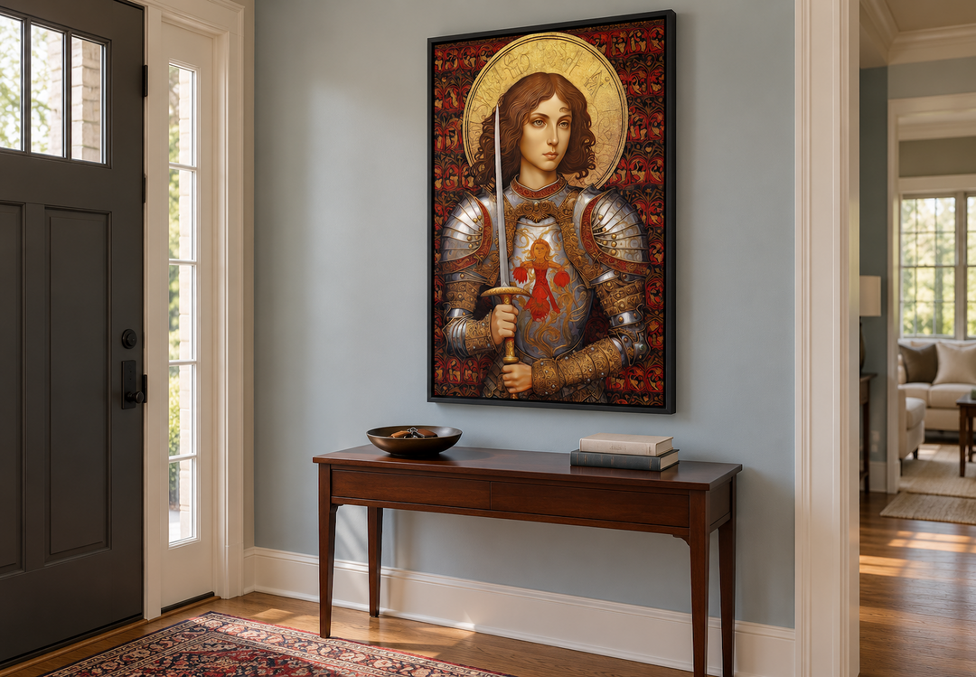 St. Joan of Arc framed canvas wall art in a classical style hanging above a wooden console table.