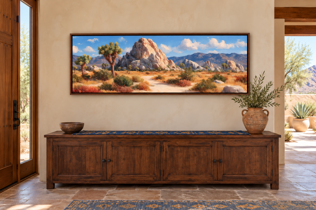 Joshua Tree Forest long horizontal canvas wall art in a walnut frame above a wooden console table.
