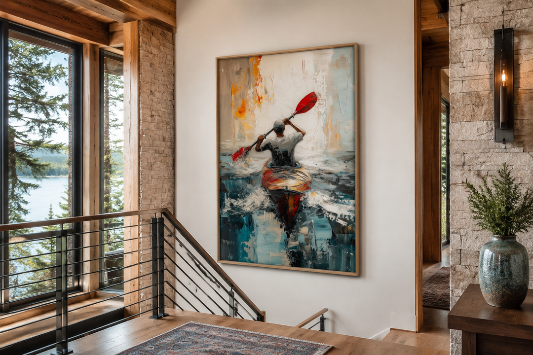 Abstract framed canvas wall art of a kayaker on a lake, displayed in a rustic cabin interior.